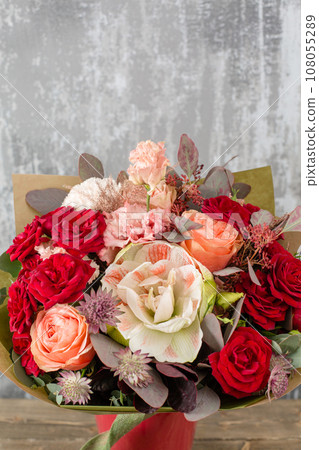 Floral shop concept. Small Beautiful bouquet of mixed flowers. Beautiful fresh cut bouquet. Flowers delivery 108055289
