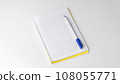 Checkered notebook with pen on white background, space for inscription 108055771