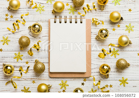 Christmas blank greeting card mock-up scene. Creative layout made of Christmas tree branches and paper card note. Flat lay. Nature New Year concept Christmas blank greeting card mock-up scene. Creative layout made of Christmas tree branches and paper card note. Flat lay. Nature New Year concept 108056072