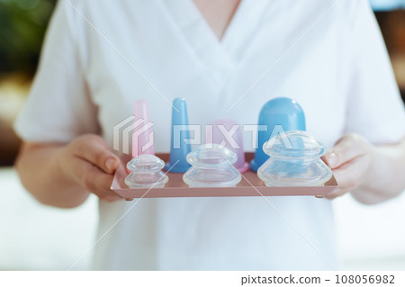 Closeup on massage therapist woman in massage cabinet Closeup on massage therapist woman in massage cabinet 108056982