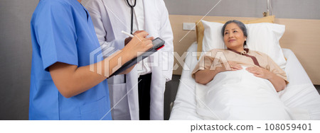 Specialist doctor and nurse explaining and check with elderly patient in hospital. Specialist doctor and nurse explaining and check with elderly patient in hospital. 108059401