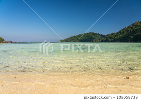 Beautiful Mai Ngam beach and shallow water coral reef in Surin island national park, Pang Nga, Thailand. 108059739