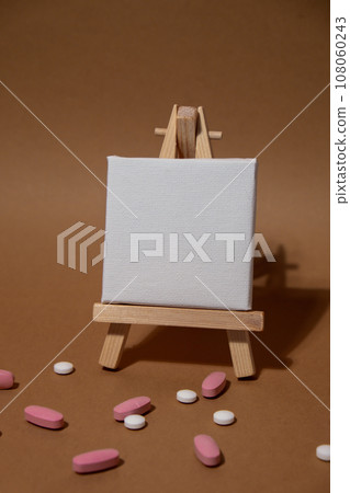 Closeup of doses of tablets for daily take medicine with white pink drugs and capsules with paper note Copy space for your text template mock up. Daily vitamins at home. Health care and diseases cure Closeup of doses of tablets for daily take medicine with white pink drugs and capsules with paper note Copy space for your text template mock up. Daily vitamins at home. Health care and diseases cure 108060243