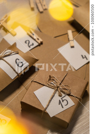 Original Advent Calendar for Christmas Homemade. Preparation to Christmas concept. Family winter holidays. Eco friendly presents gifts. open the package every day 108060500