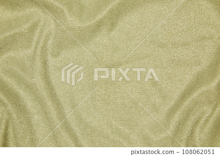 Background of draped light green fabric with silver lurex thread Background of draped light green fabric with silver lurex thread 108062051