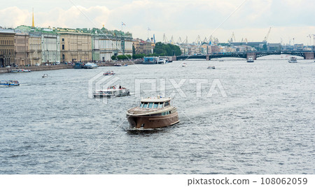 view of the Neva River in the historical center of St. Petersburg with the Hermitage and Palace Bridge 108062059