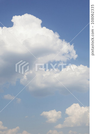 Blue sky with clouds. Vertical photo.Copy space. Blue sky with clouds. Vertical photo.Copy space. 108062335