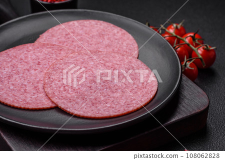 Delicious smoked salami sausage with salt, spices and herbs 108062828