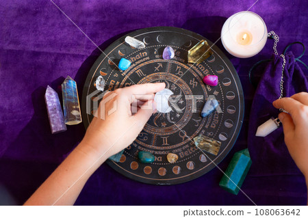 Top view of astrologer hands Top view of astrologer hands 108063642