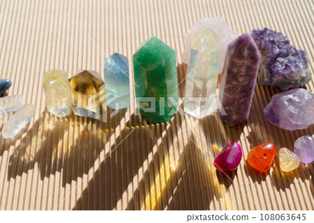 Healing crystals on brown background 108063645
