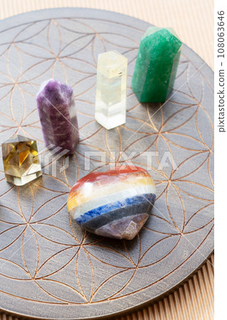 Healing crystals on brown background 108063646