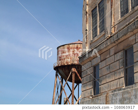Alcatraz prison and water tower in the distance Alcatraz prison and water tower in the distance 108063917