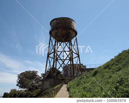Path to Rusted out Water Tower with prison behind it Path to Rusted out Water Tower with prison behind it 108063979