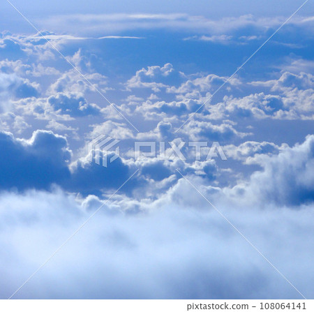 On top of fluffy curvy clouds 108064141