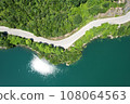 aerial forest road by the lake 108064563