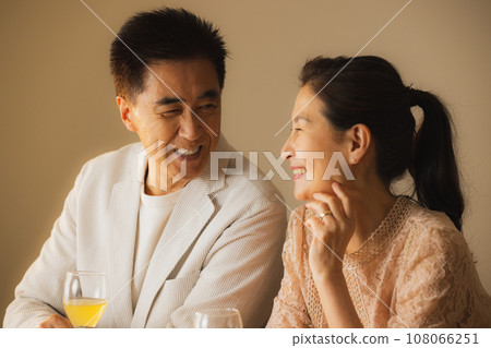 Senior couple drinking alcohol Senior couple drinking alcohol 108066251