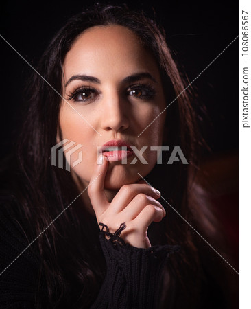 Portrait shot of a young self confident woman 108066567