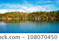 Pink Lake, Gatineau, Quebec, Canada during fall season with colorful tree 108070450