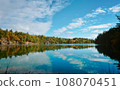 Pink Lake, Gatineau, Quebec, Canada during fall season with colorful tree 108070451