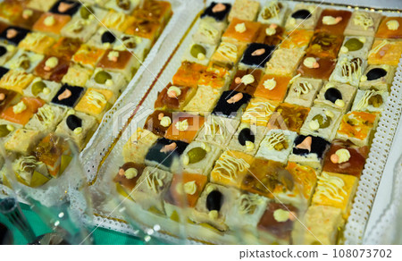 Different fancy cakes on banquet table Different fancy cakes on banquet table 108073702