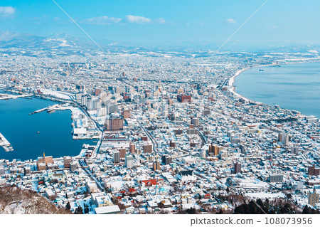 Beautiful landscape and cityscape from Hakodate Mountain with Snow in winter season. landmark and popular for attractions in Hokkaido, Japan.Travel and Vacation concept 108073956