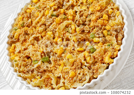 Creamy Corn Casserole with Sausage in baking dish 108074232