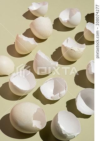 Eggshell flat lay. Monochrome Easter composition. Eggshell flat lay. Monochrome Easter composition. 108074277