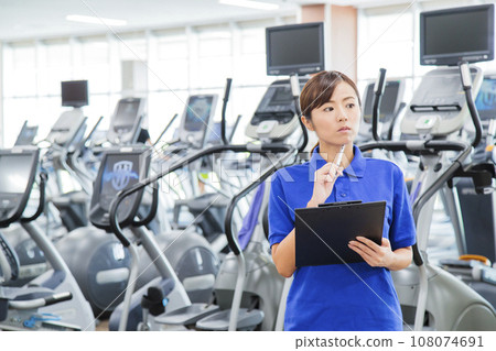 Young woman training in the gym Young woman training in the gym 108074691
