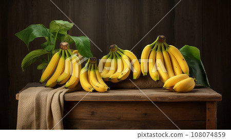 Yellow bananas on old brown wooden table. High quality photo 108074859