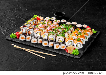 Set for big company with makizushi, Philadelphia and California rolls Set for big company with makizushi, Philadelphia and California rolls 108075326