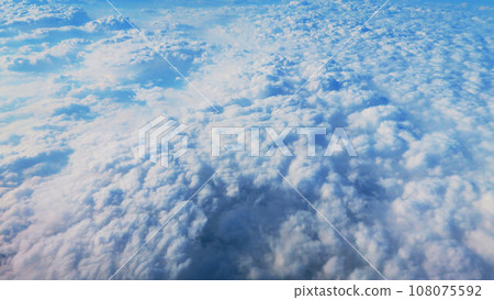Landscape of aircraft wing, blue sky and sea of clouds Landscape of aircraft wing, blue sky and sea of clouds 108075592