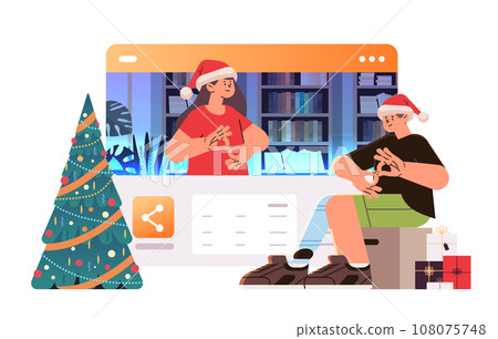 deaf man in santa claus hat with replaced robotic leg communicate with woman using sign language disabled deaf-mute guy with prosthesis body part 108075748
