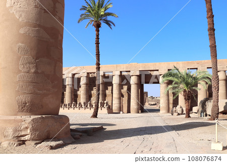 Ancient column and ram-headed sphinxes in so-called Ethiopian court, Karnak temple complex, Luxor, Egypt, North Africa 108076874