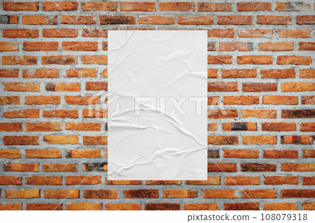 Blank white wheatpaste glued paper poster mockup on brick wall background Blank white wheatpaste glued paper poster mockup on brick wall background 108079318