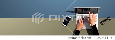 Person using a laptop computer 108081183