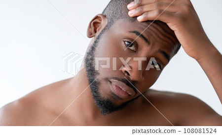 Barber care. Male hairstyle. Confident bearded handsome masculine shirtless man touching head hair perfect healthy skin isolated on white background. Barber care. Male hairstyle. Confident bearded handsome masculine shirtless man touching head hair perfect healthy skin isolated on white background. 108081524