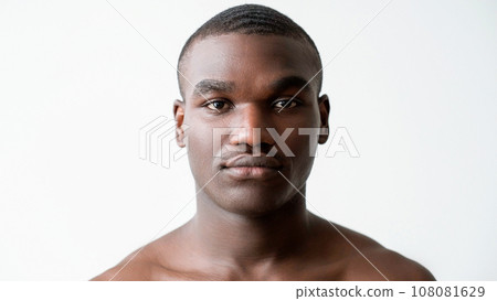 Male cosmetology. Face care. Confident handsome shirtless man with smooth radiant flawless healthy facial skin isolated on white background. Male cosmetology. Face care. Confident handsome shirtless man with smooth radiant flawless healthy facial skin isolated on white background. 108081629