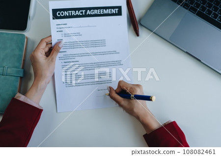 The lawyer with a client discussing contract paper, a Business lawyer working about legal legislation in the courtroom to help their customer, contract and agreement concept 108082461