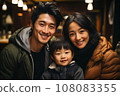 Portrait of Asian family of parents and child in cafe 108083355