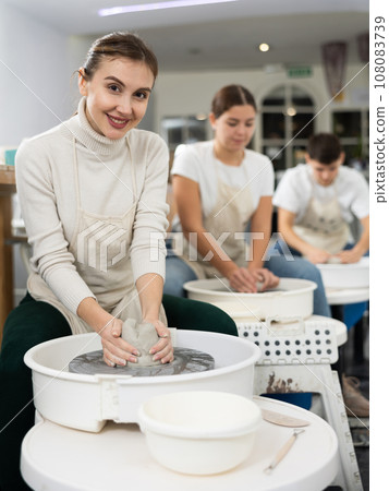 Woman working with pottery wheel Woman working with pottery wheel 108083739
