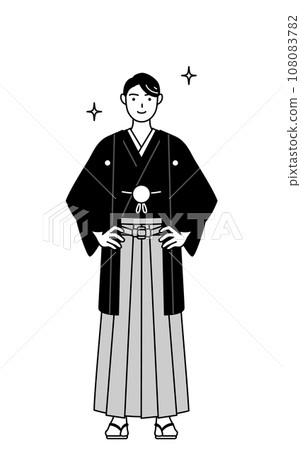A man wearing a crested hakama with his hands on his hips 108083782