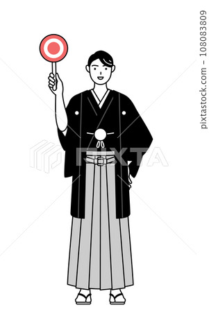 身穿鳳頭袴的男子手持一根顯示正確答案的圓棒 108083809