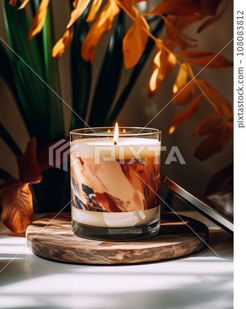 Burning candle in glass jar, vivid studio background with decor and shadows, candle mockup 108083812