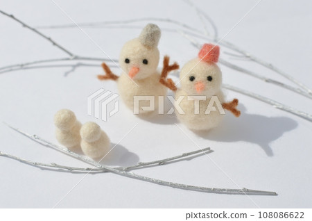 felt snowman and silver branches 108086622