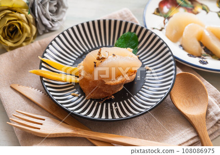 Pear compote on bread 108086975