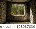 View through the hole for a windows in a damaged abandoned panel house. 108087830