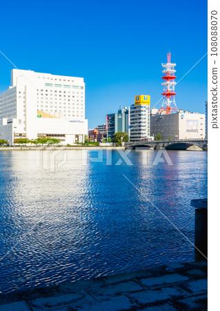 Bandai Bridge spanning the Shinano River and the cityscape of Chuo Ward, Niigata City Bandai Bridge spanning the Shinano River and the cityscape of Chuo Ward, Niigata City 108088070