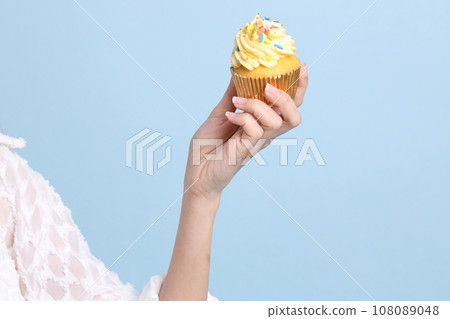 Hand with Dessert 108089048