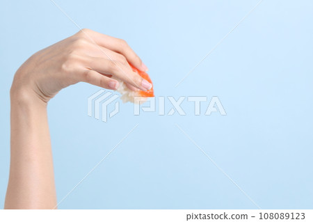 Hand with Sushi Hand with Sushi 108089123