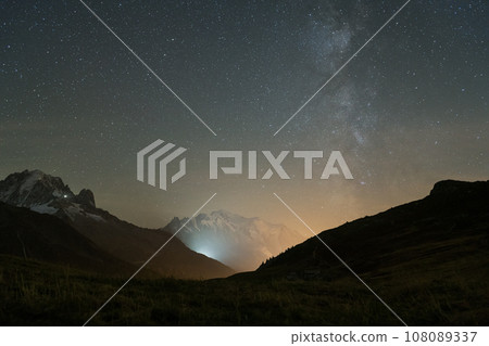 Milky Way over Mont Blanc Mountain. Starry Sky. Night Landscape. View from Col des Posettes, France Milky Way over Mont Blanc Mountain. Starry Sky. Night Landscape. View from Col des Posettes, France 108089337